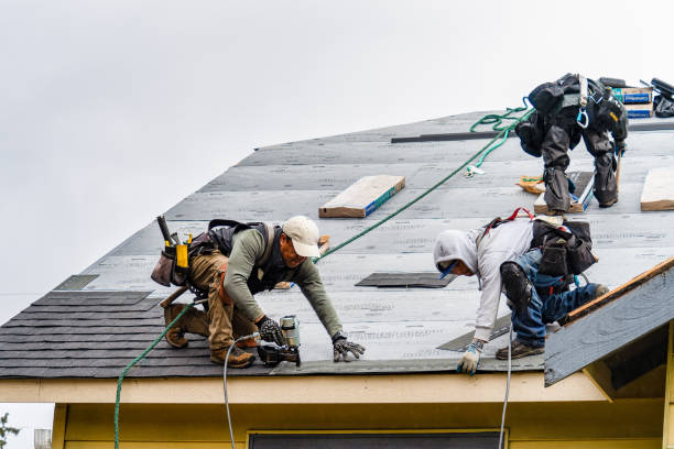 Professional Roofing technician working in Centereach, NY